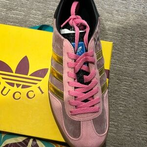 Limited edition Gucci/Adidas pink velvet with golds metallic stripes